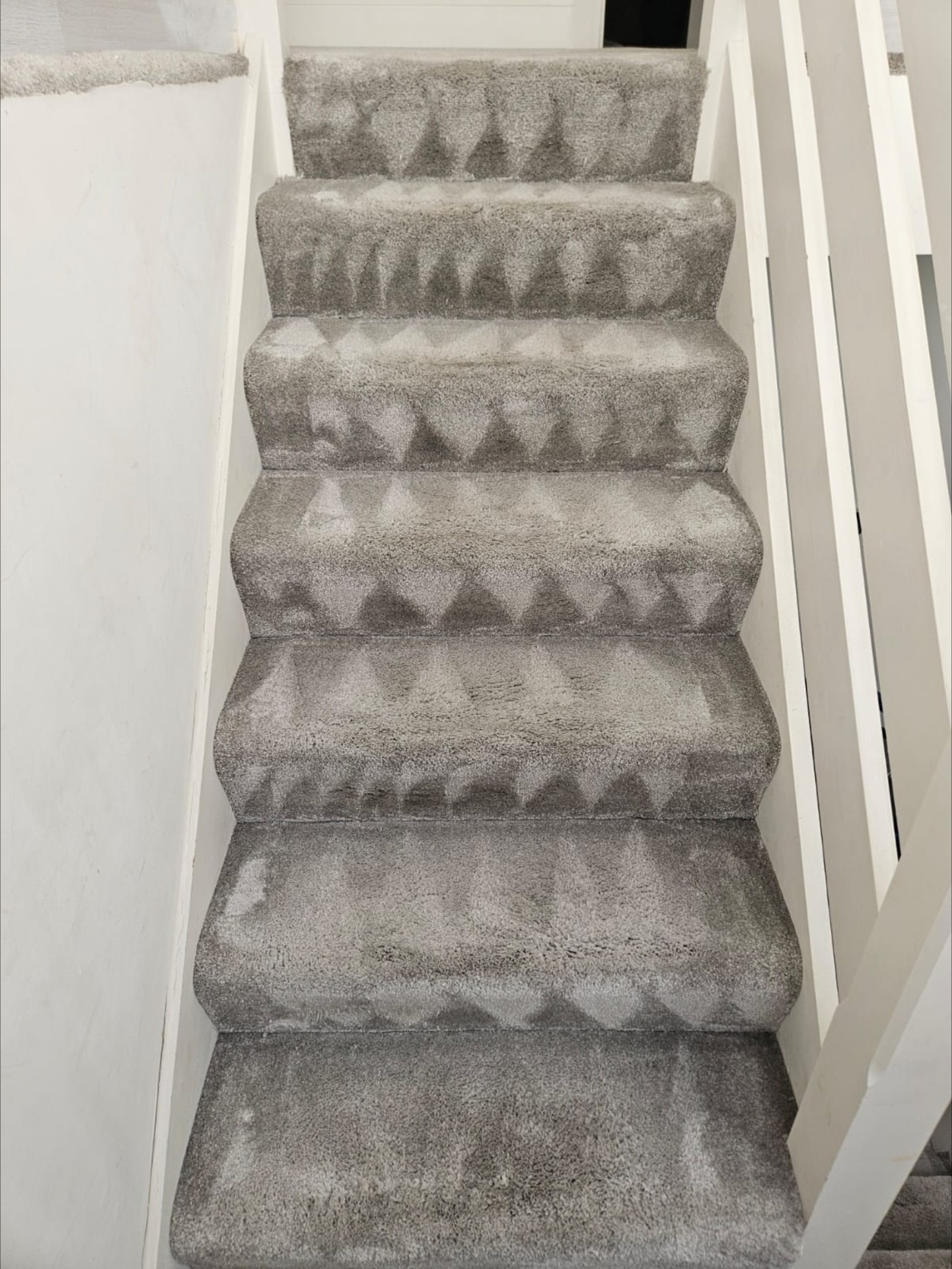 Stained stair carpet before cleaning